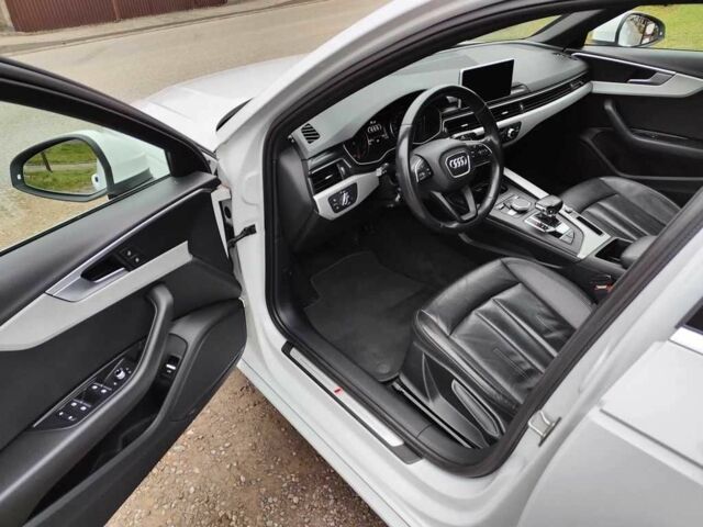 Белый Ауди А4, объемом двигателя 2 л и пробегом 80 тыс. км за 11200 $, фото 12 на Automoto.ua