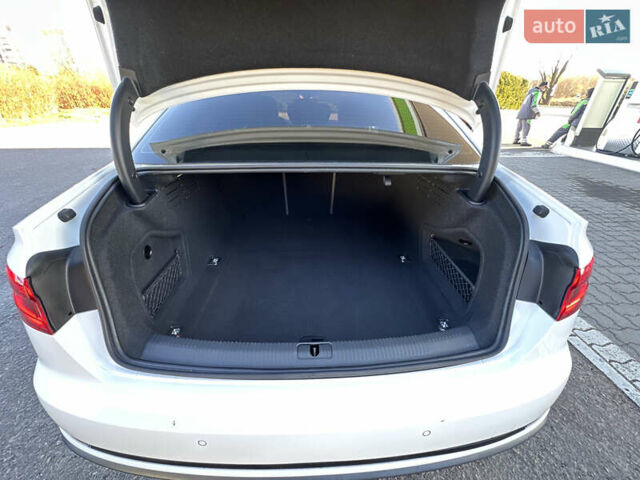 Белый Ауди А4, объемом двигателя 2 л и пробегом 122 тыс. км за 18650 $, фото 93 на Automoto.ua