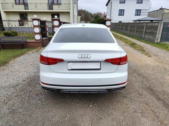 Белый Ауди А4, объемом двигателя 2 л и пробегом 80 тыс. км за 11200 $, фото 3 на Automoto.ua