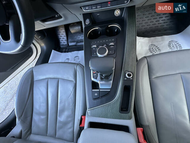 Белый Ауди А4, объемом двигателя 2 л и пробегом 122 тыс. км за 18650 $, фото 122 на Automoto.ua