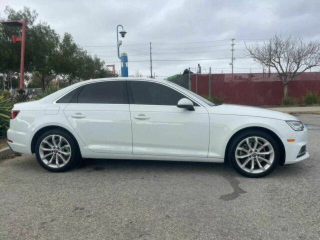 Белый Ауди А4, объемом двигателя 2 л и пробегом 31 тыс. км за 12000 $, фото 7 на Automoto.ua