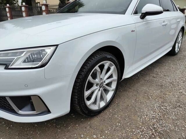 Белый Ауди А4, объемом двигателя 2 л и пробегом 80 тыс. км за 11200 $, фото 8 на Automoto.ua