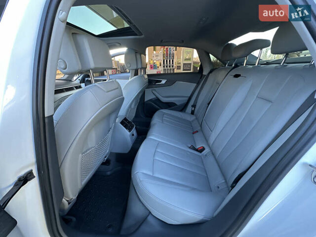 Белый Ауди А4, объемом двигателя 2 л и пробегом 122 тыс. км за 18650 $, фото 86 на Automoto.ua