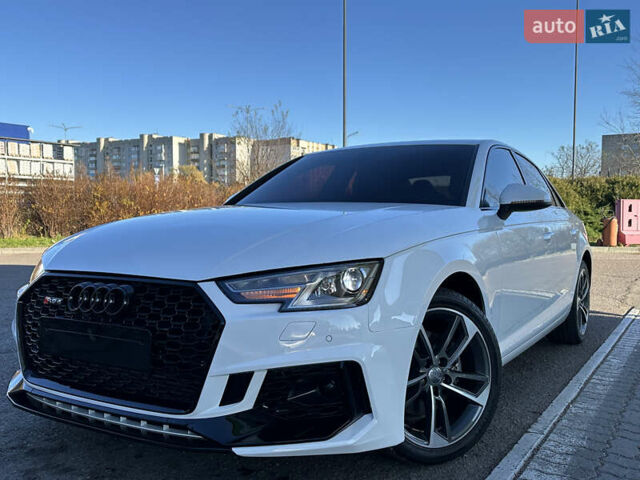 Белый Ауди А4, объемом двигателя 2 л и пробегом 122 тыс. км за 18650 $, фото 2 на Automoto.ua