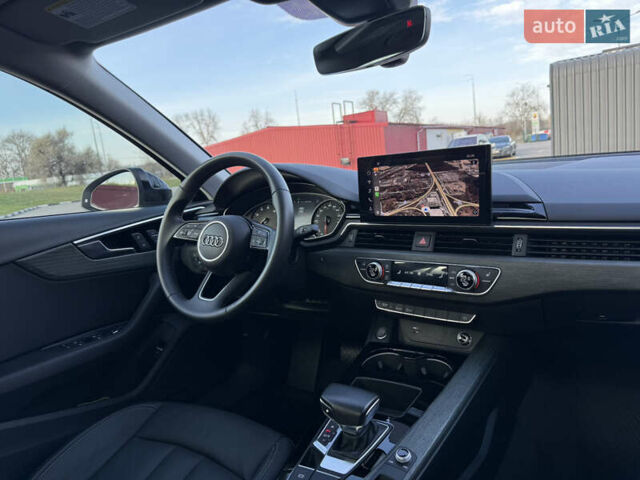 Білий Ауді А4, об'ємом двигуна 2 л та пробігом 126 тис. км за 23900 $, фото 58 на Automoto.ua