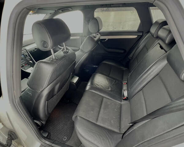 Білий Ауді А4, об'ємом двигуна 2 л та пробігом 249 тис. км за 7150 $, фото 13 на Automoto.ua