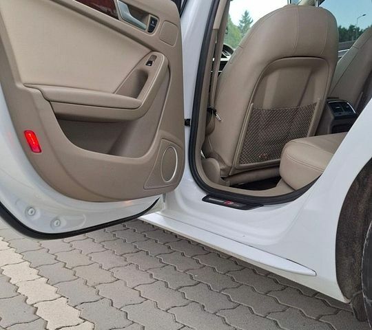 Білий Ауді А4, об'ємом двигуна 2 л та пробігом 246 тис. км за 9000 $, фото 37 на Automoto.ua