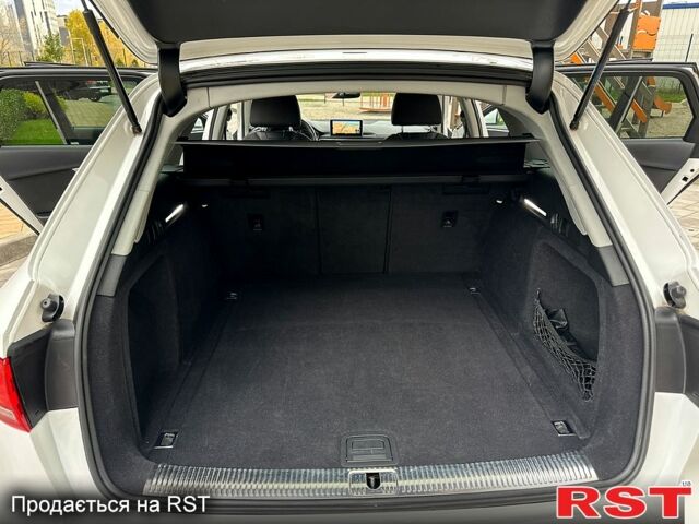 Білий Ауді А4, об'ємом двигуна 2 л та пробігом 227 тис. км за 16333 $, фото 12 на Automoto.ua