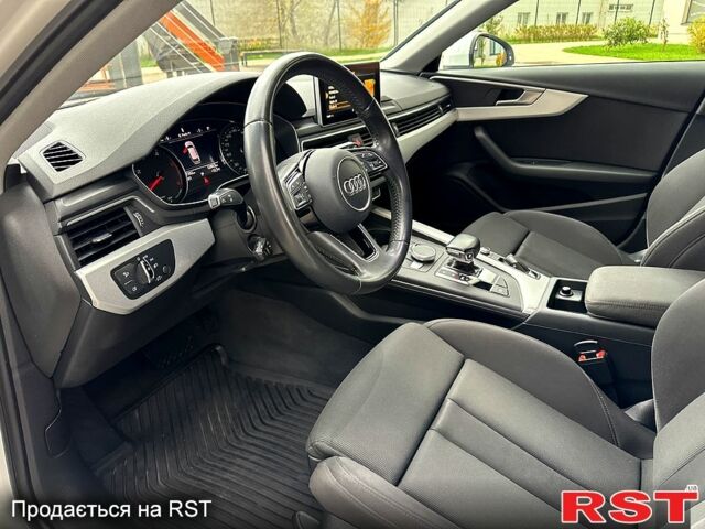 Білий Ауді А4, об'ємом двигуна 2 л та пробігом 227 тис. км за 16333 $, фото 8 на Automoto.ua