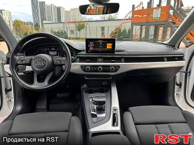 Білий Ауді А4, об'ємом двигуна 2 л та пробігом 227 тис. км за 16333 $, фото 11 на Automoto.ua