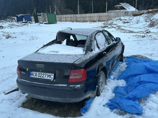 Черный Ауди А4, объемом двигателя 1.6 л и пробегом 270 тыс. км за 999 $, фото 2 на Automoto.ua