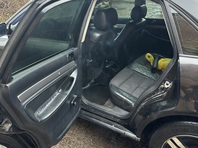 Черный Ауди А4, объемом двигателя 1.8 л и пробегом 350 тыс. км за 2550 $, фото 14 на Automoto.ua