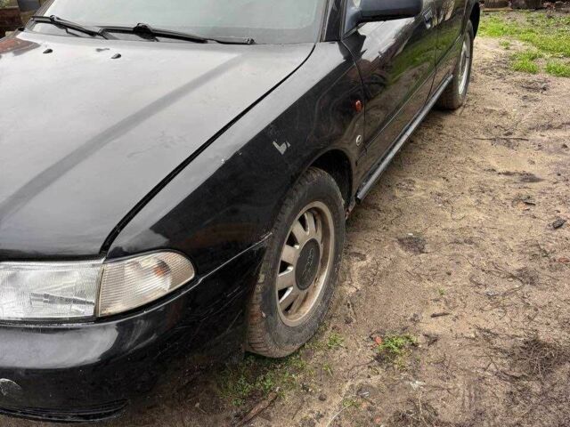 Черный Ауди А4, объемом двигателя 1.6 л и пробегом 250 тыс. км за 1500 $, фото 1 на Automoto.ua