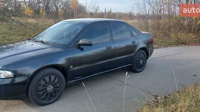 Черный Ауди А4, объемом двигателя 1.6 л и пробегом 276 тыс. км за 3500 $, фото 2 на Automoto.ua
