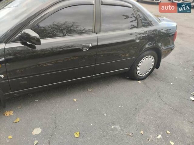 Черный Ауди А4, объемом двигателя 1.8 л и пробегом 370 тыс. км за 3000 $, фото 6 на Automoto.ua