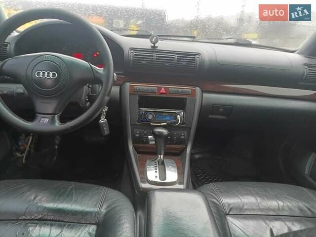 Черный Ауди А4, объемом двигателя 1.8 л и пробегом 100 тыс. км за 3500 $, фото 4 на Automoto.ua
