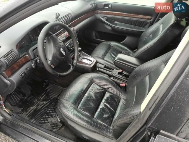 Черный Ауди А4, объемом двигателя 1.8 л и пробегом 100 тыс. км за 3500 $, фото 21 на Automoto.ua