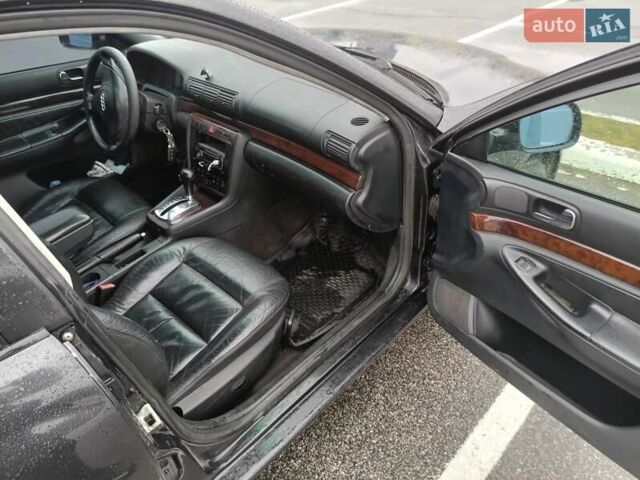 Черный Ауди А4, объемом двигателя 1.8 л и пробегом 100 тыс. км за 3500 $, фото 9 на Automoto.ua