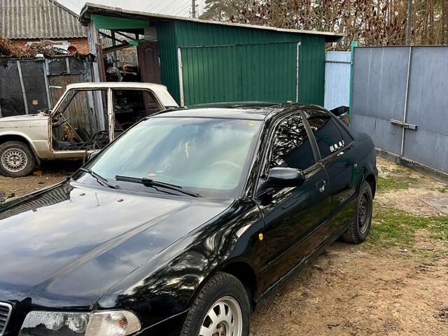 Черный Ауди А4, объемом двигателя 1.8 л и пробегом 402 тыс. км за 3800 $, фото 1 на Automoto.ua