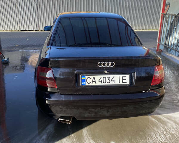 Черный Ауди А4, объемом двигателя 1.78 л и пробегом 386 тыс. км за 3400 $, фото 3 на Automoto.ua