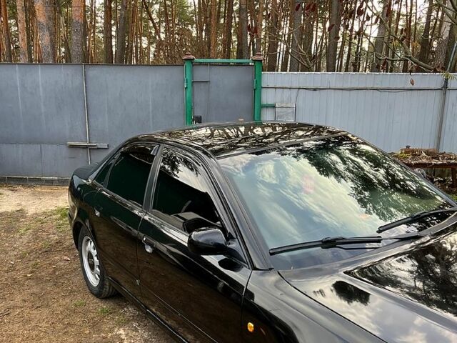 Черный Ауди А4, объемом двигателя 1.8 л и пробегом 402 тыс. км за 3800 $, фото 2 на Automoto.ua