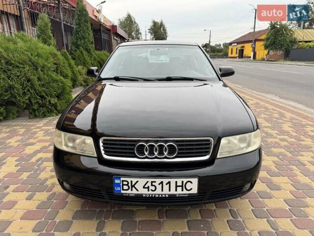 Черный Ауди А4, объемом двигателя 1.6 л и пробегом 301 тыс. км за 3800 $, фото 1 на Automoto.ua