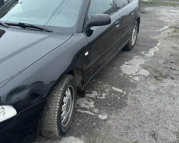 Черный Ауди А4, объемом двигателя 1.6 л и пробегом 206 тыс. км за 3800 $, фото 7 на Automoto.ua