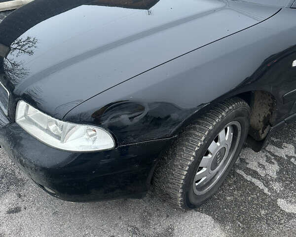 Черный Ауди А4, объемом двигателя 1.6 л и пробегом 206 тыс. км за 3800 $, фото 3 на Automoto.ua