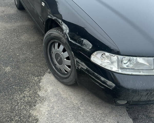 Черный Ауди А4, объемом двигателя 1.6 л и пробегом 206 тыс. км за 3800 $, фото 2 на Automoto.ua