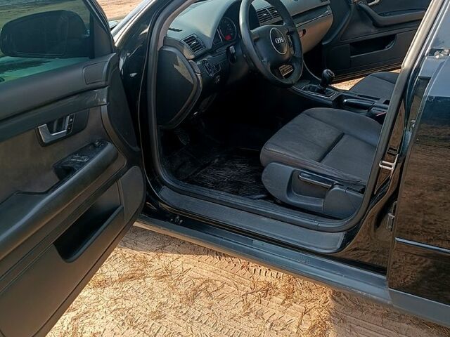 Чорний Ауді А4, об'ємом двигуна 2 л та пробігом 335 тис. км за 5200 $, фото 5 на Automoto.ua