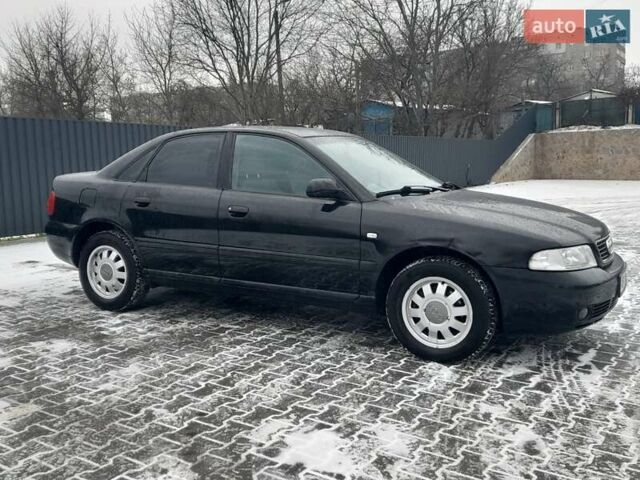 Чорний Ауді А4, об'ємом двигуна 1.6 л та пробігом 206 тис. км за 3999 $, фото 4 на Automoto.ua