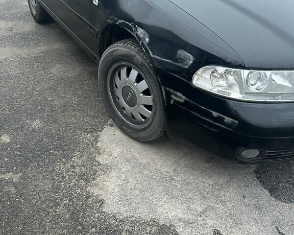 Черный Ауди А4, объемом двигателя 1.6 л и пробегом 206 тыс. км за 3800 $, фото 5 на Automoto.ua