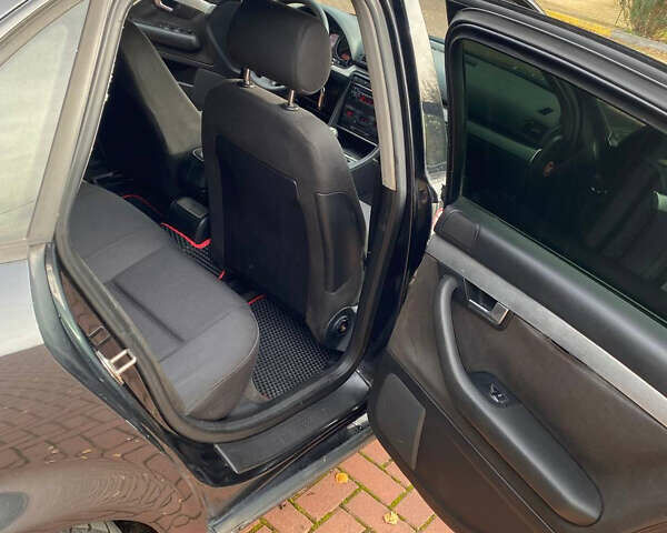 Ауді А4 2001 у Хмельницькому на Automoto.ua Чорний Ауді А4, об'ємом двигуна 2.5 л та пробігом 305 тис. км за 4700 $, фото 21 на Automoto.ua