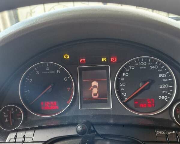 Черный Ауди А4, объемом двигателя 1.8 л и пробегом 155 тыс. км за 5300 $, фото 12 на Automoto.ua