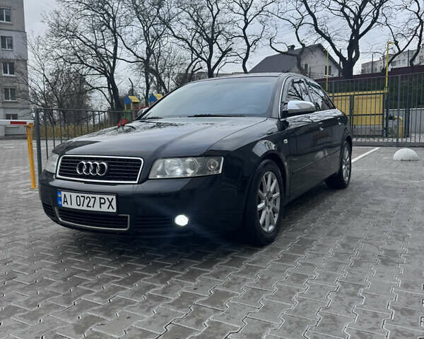 Черный Ауди А4, объемом двигателя 1.9 л и пробегом 430 тыс. км за 5600 $, фото 1 на Automoto.ua