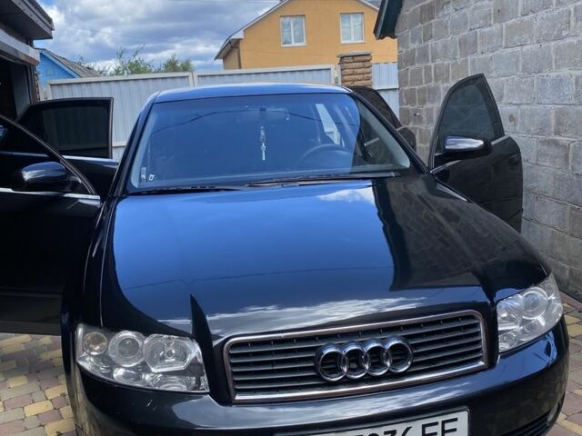 Черный Ауди А4, объемом двигателя 1.6 л и пробегом 228 тыс. км за 5500 $, фото 1 на Automoto.ua