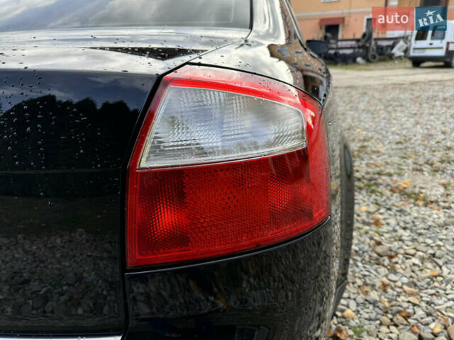 Черный Ауди А4, объемом двигателя 2 л и пробегом 308 тыс. км за 5499 $, фото 50 на Automoto.ua