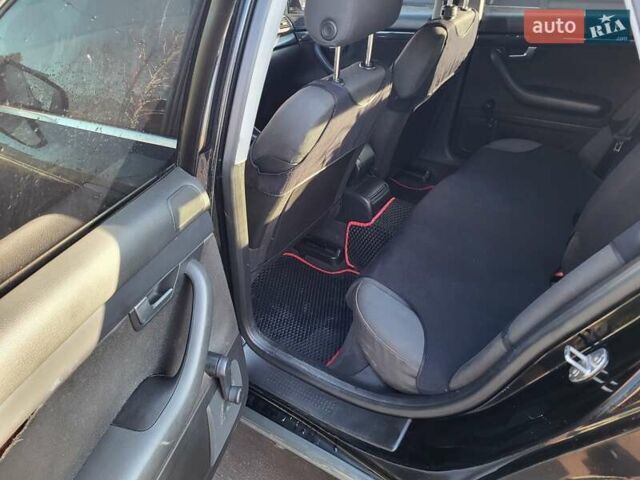 Черный Ауди А4, объемом двигателя 2 л и пробегом 309 тыс. км за 4800 $, фото 7 на Automoto.ua