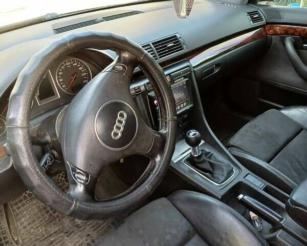 Черный Ауди А4, объемом двигателя 1.98 л и пробегом 320 тыс. км за 4600 $, фото 3 на Automoto.ua