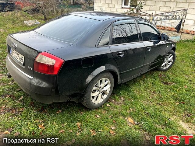 Черный Ауди А4, объемом двигателя 2 л и пробегом 343 тыс. км за 4300 $, фото 1 на Automoto.ua
