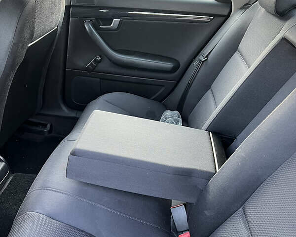 Черный Ауди А4, объемом двигателя 1.6 л и пробегом 215 тыс. км за 5600 $, фото 11 на Automoto.ua