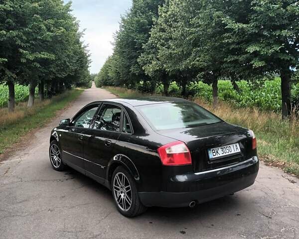 Черный Ауди А4, объемом двигателя 1.98 л и пробегом 298 тыс. км за 4600 $, фото 3 на Automoto.ua
