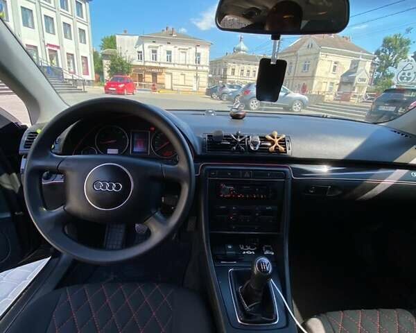 Черный Ауди А4, объемом двигателя 1.6 л и пробегом 260 тыс. км за 4499 $, фото 12 на Automoto.ua
