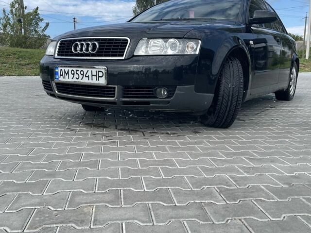 Черный Ауди А4, объемом двигателя 2 л и пробегом 341 тыс. км за 5000 $, фото 1 на Automoto.ua