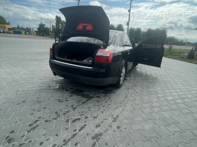 Черный Ауди А4, объемом двигателя 2 л и пробегом 341 тыс. км за 5000 $, фото 4 на Automoto.ua