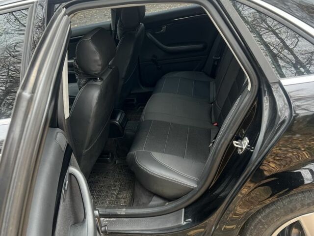 Чорний Ауді А4, об'ємом двигуна 1.8 л та пробігом 212 тис. км за 4700 $, фото 7 на Automoto.ua