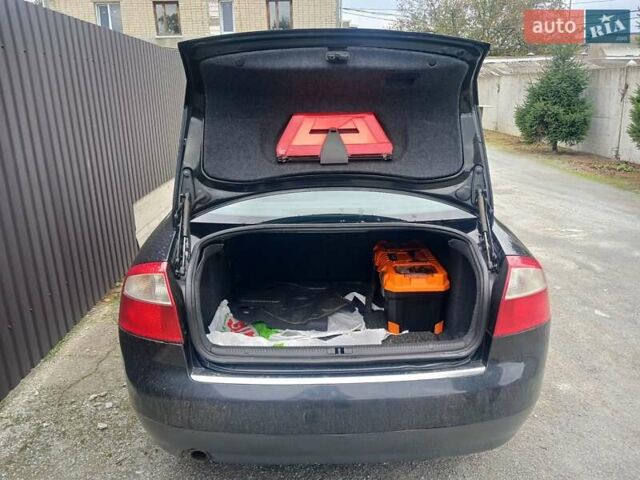 Чорний Ауді А4, об'ємом двигуна 1.98 л та пробігом 293 тис. км за 5500 $, фото 3 на Automoto.ua