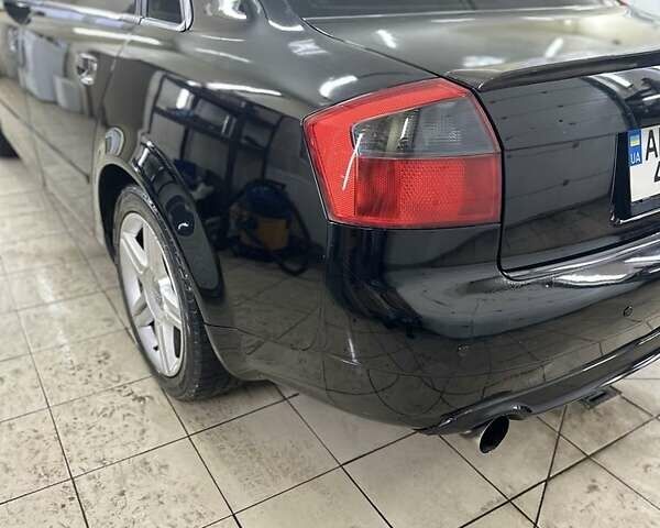 Черный Ауди А4, объемом двигателя 1.8 л и пробегом 295 тыс. км за 5600 $, фото 12 на Automoto.ua