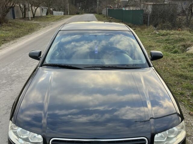 Чорний Ауді А4, об'ємом двигуна 1.6 л та пробігом 216 тис. км за 5000 $, фото 1 на Automoto.ua