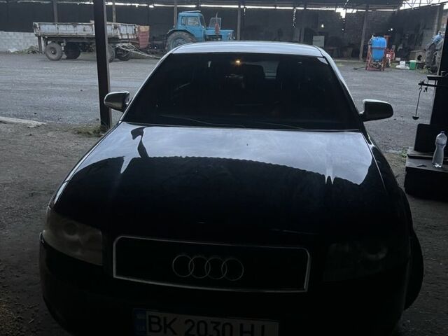 Черный Ауди А4, объемом двигателя 2.5 л и пробегом 250 тыс. км за 4100 $, фото 1 на Automoto.ua